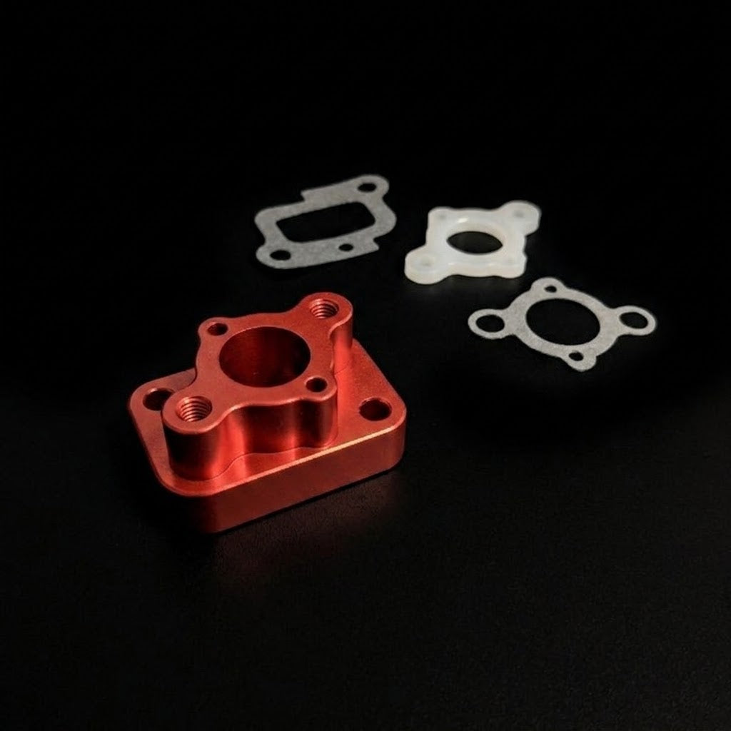 ALLOY INSULATOR MANIFOLD 23 to 29cc ORANGE